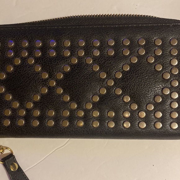 NWOT. Black wristlet with metal round embellishments. - Picture 4 of 4
